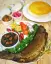 طرز تهیه ماهی شکم پر خوشمزه و مجلسی با رب انار مرحله به مرحله