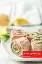 طرز تهیه رول سالمون دودی خوشمزه با پنیر خامه ای و نان ترتیلا