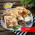 طرز تهیه کسادیا مکزیکی خوشمزه با گوشت چرخ کرده و نان ترتیلا