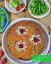 طرز تهیه ته چین سبزی پلو با ماهی خوشمزه و مجلسی ویژه شب عید
